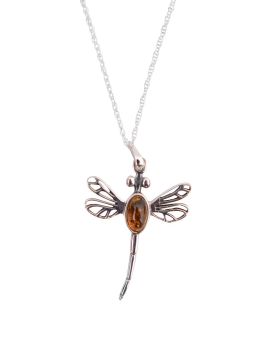 A silver necklace and pendant in the shape of a dragonfly with amber in the middle of the two wings.