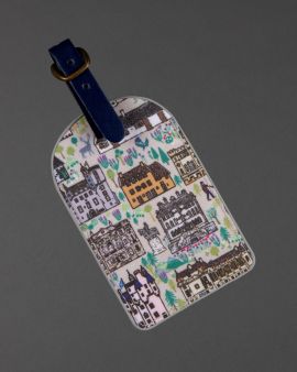 front of buildings of the national trust for scotland luggage tag